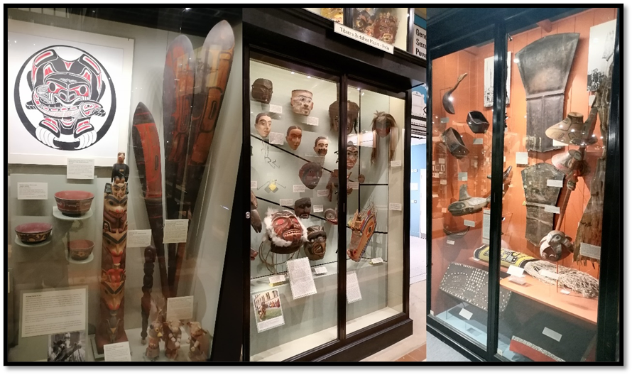 Glass cases showing ethnographic collections.